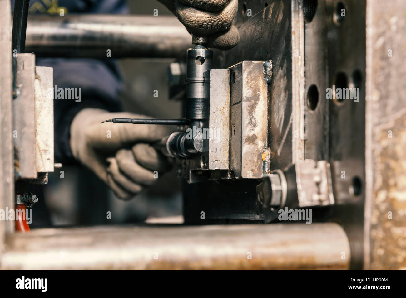 placing a mold for casting plastic Stock Photo