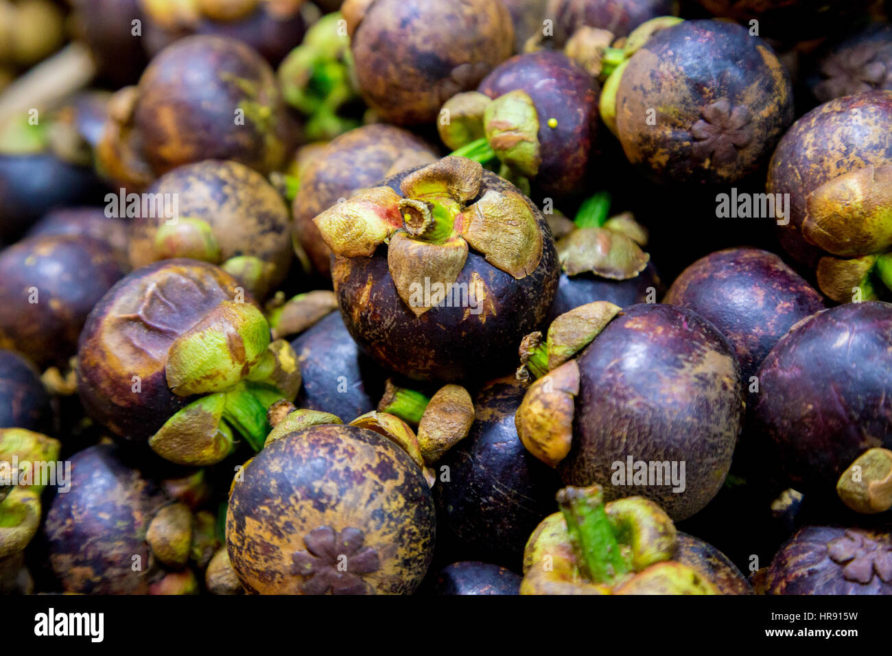 Mangosteen fruit at an Asian market Stock Photo Alamy