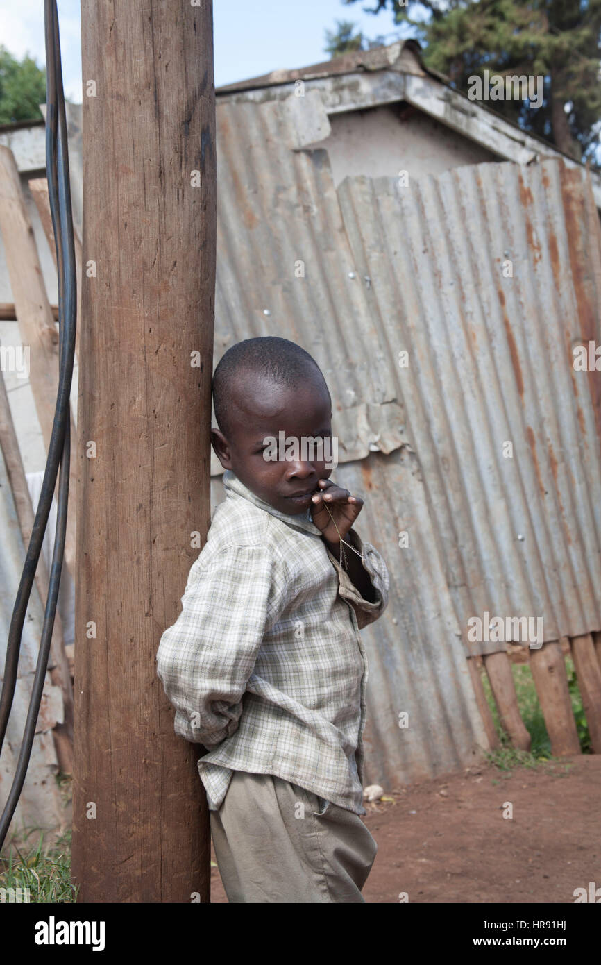 Kid in the street, Kibera slums, Nairobi, Kenya, East Africa Stock Photo