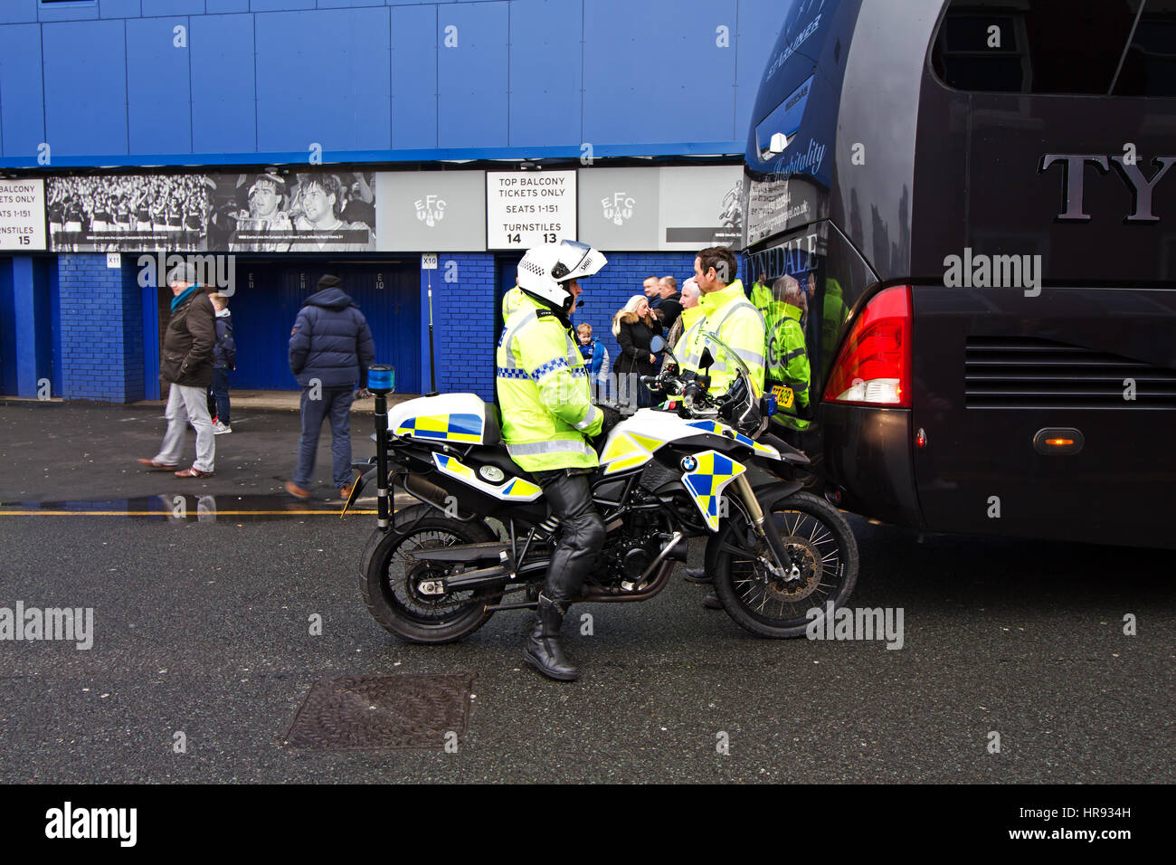 Police officers on crowd control duty as fans start to arrive at Goodison Park for Everton's home match against Sunderland, Liverpool UK. Stock Photo
