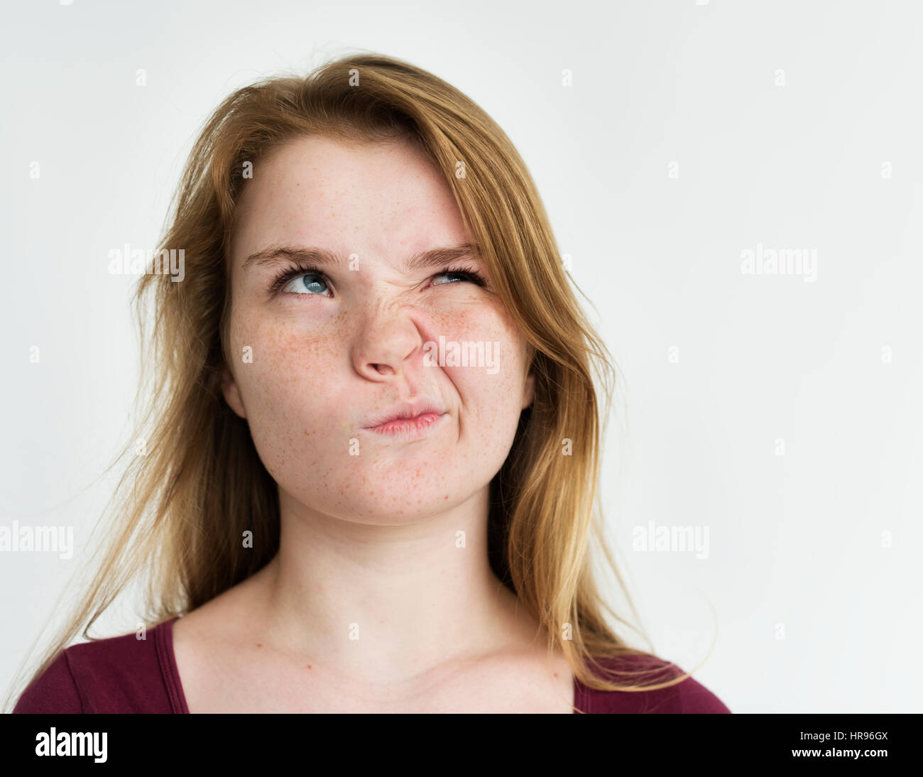 Girl annoyed face expression portrait Stock Photo - Alamy