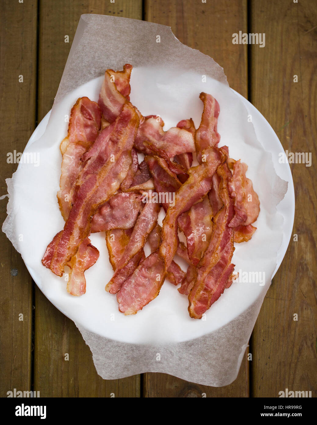 A plate of fried, crispy bacon Stock Photo