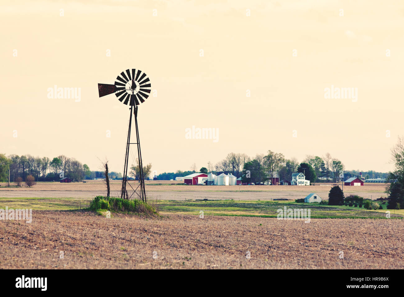 Windpump in an agricultural field. Rural midwest farm. Stock Photo