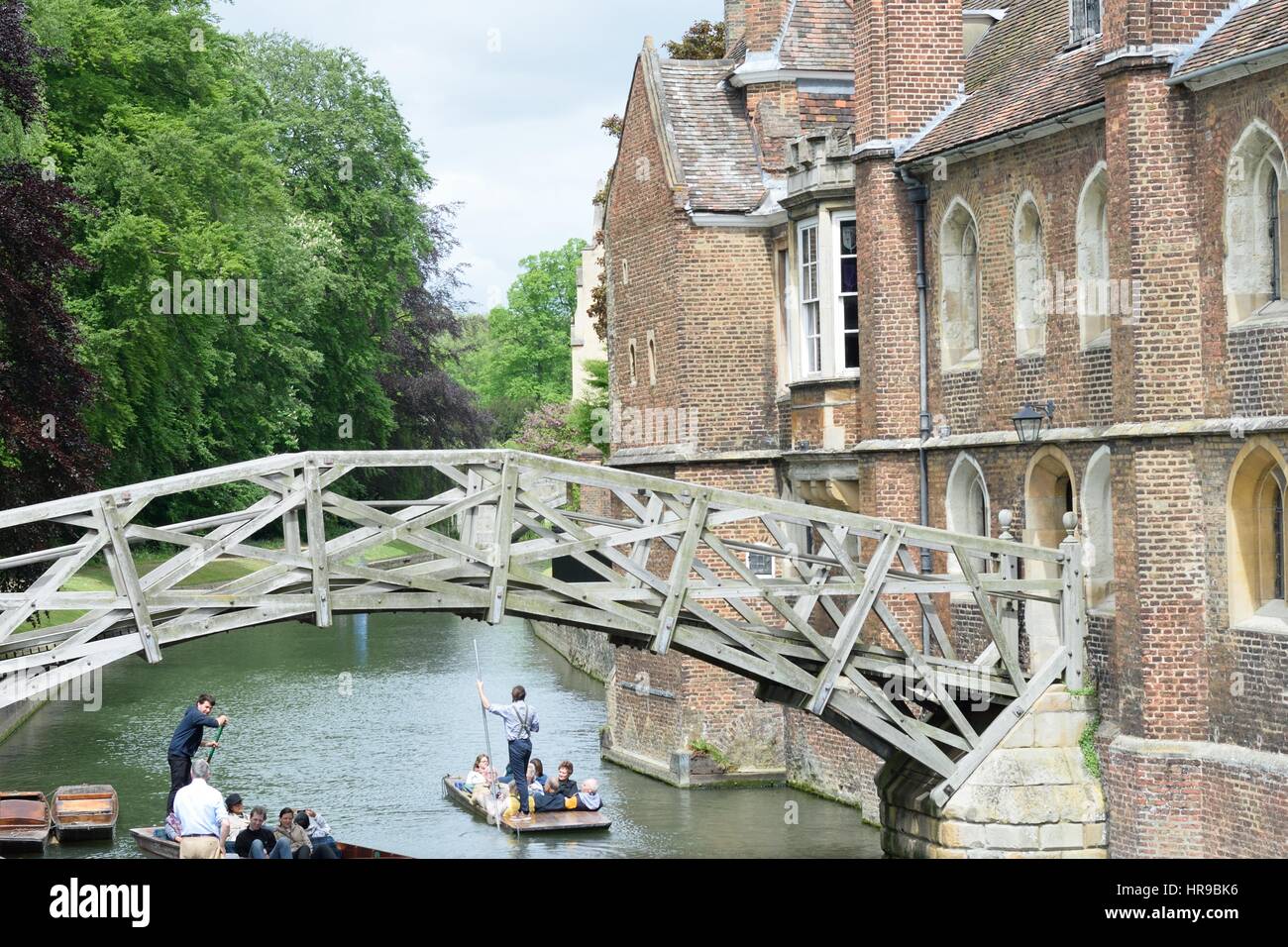 Cambridge England, United Kingdom -May 20, 2016: Punters on Cam under mathematical bridge Stock Photo