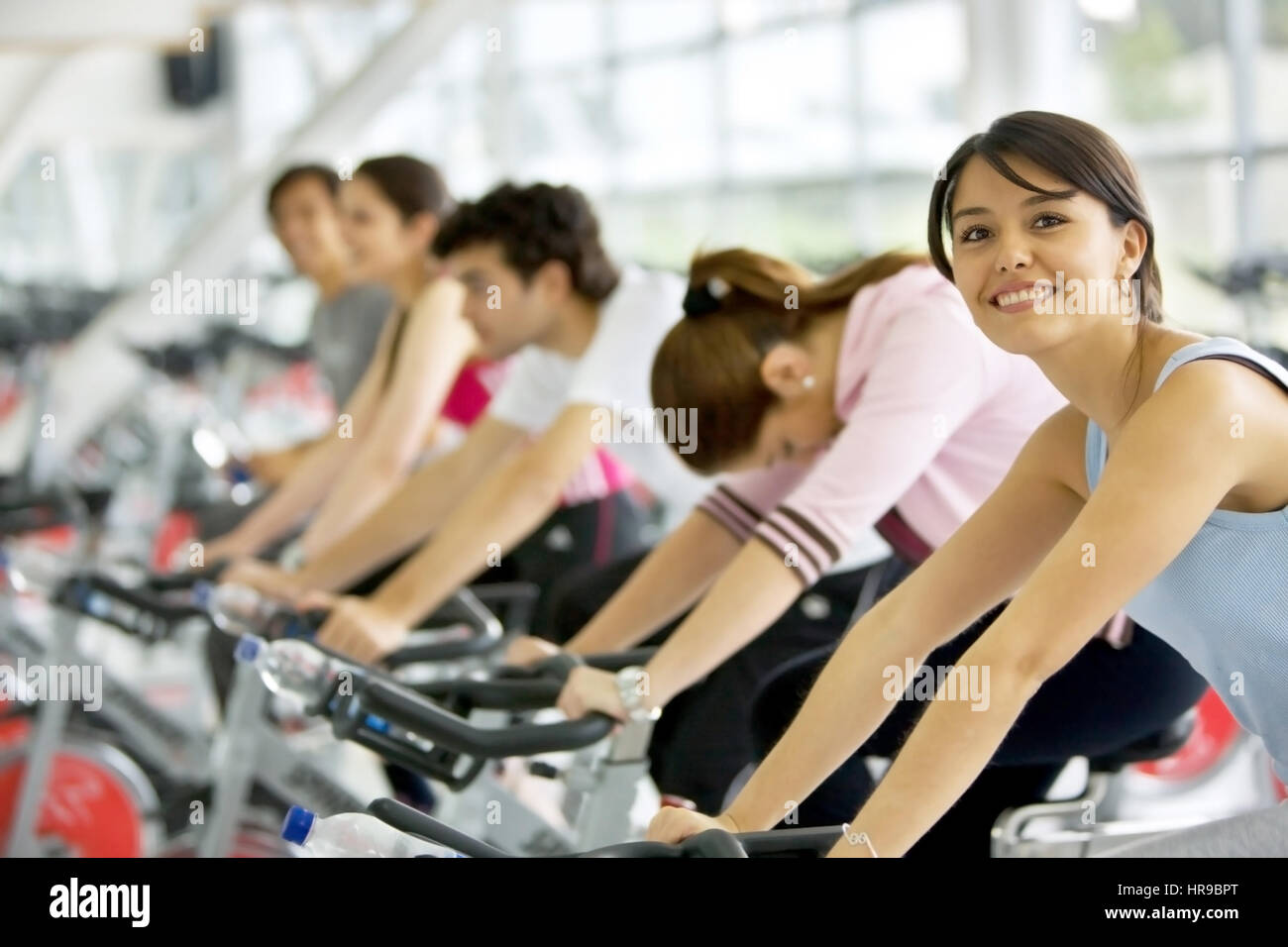 People in a spinning class at the gym Stock Photo - Alamy