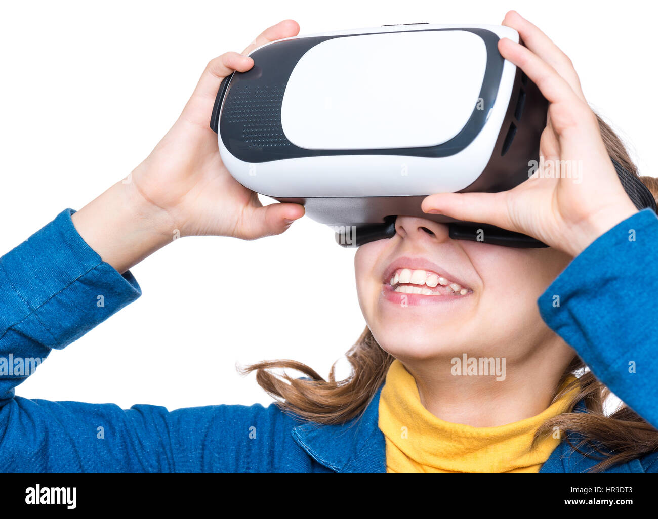 Happy little girl wearing virtual reality goggles watching movies or  playing video games. Cheerful smiling kid looking in VR glasses. Funny  child expe Stock Photo - Alamy