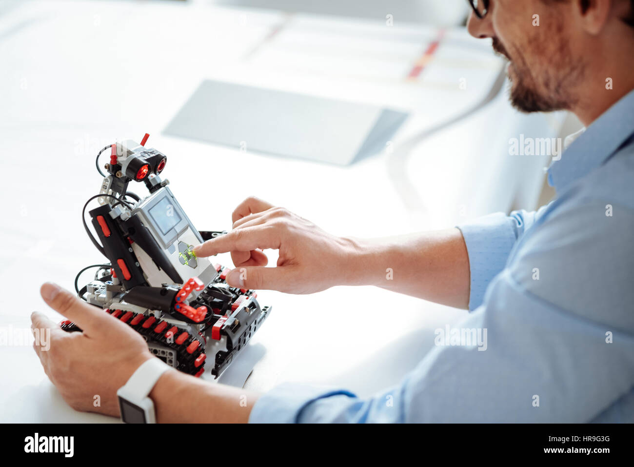 Professional engineer testing the robot Stock Photo - Alamy
