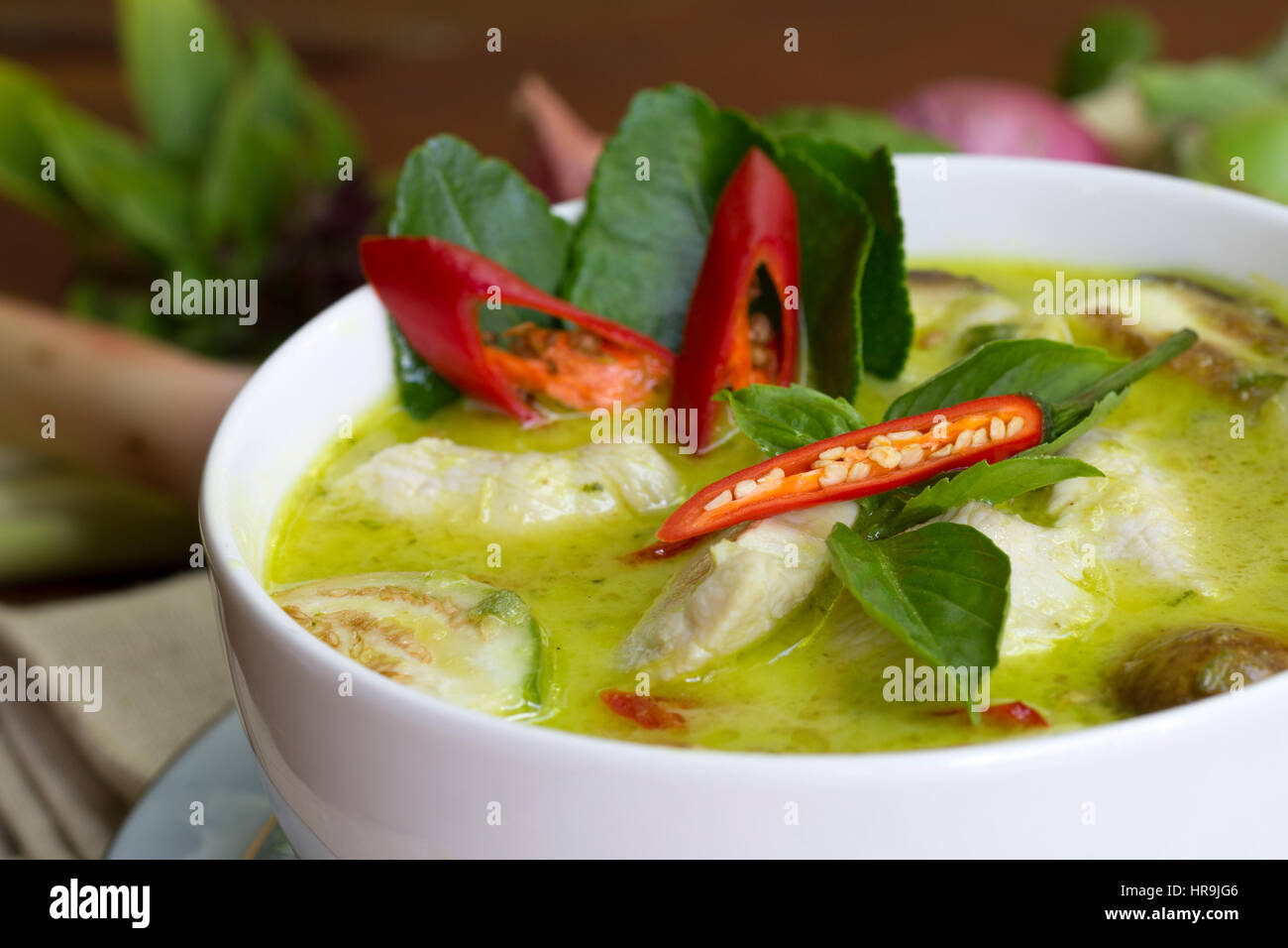 Thai Cooking: Chicken Green Curry in tight cropping closeup Stock Photo