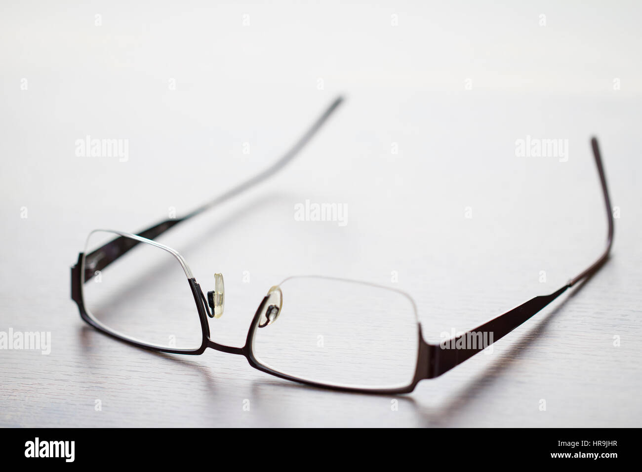 Eyeglasses in shallow depth of field isolated in white background Stock