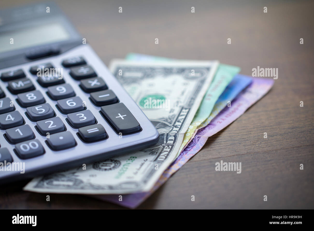 Calculator and bank notes with right space Stock Photo Alamy