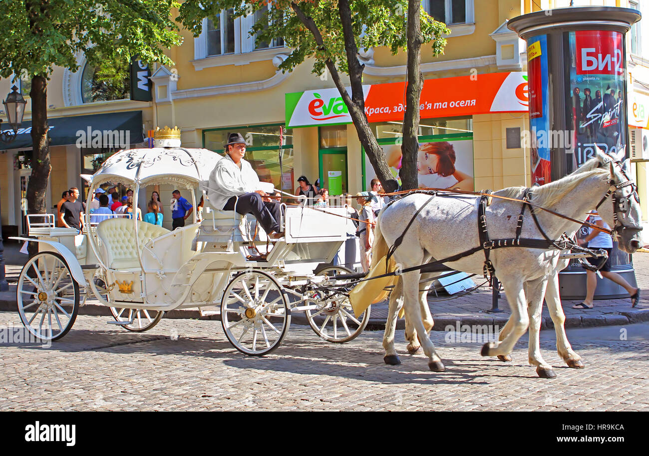 ODESA, UKRAINE - JULY 21, 2012: Tourist brougham on the streets in historical city center, Odesa, Ukraine Stock Photo