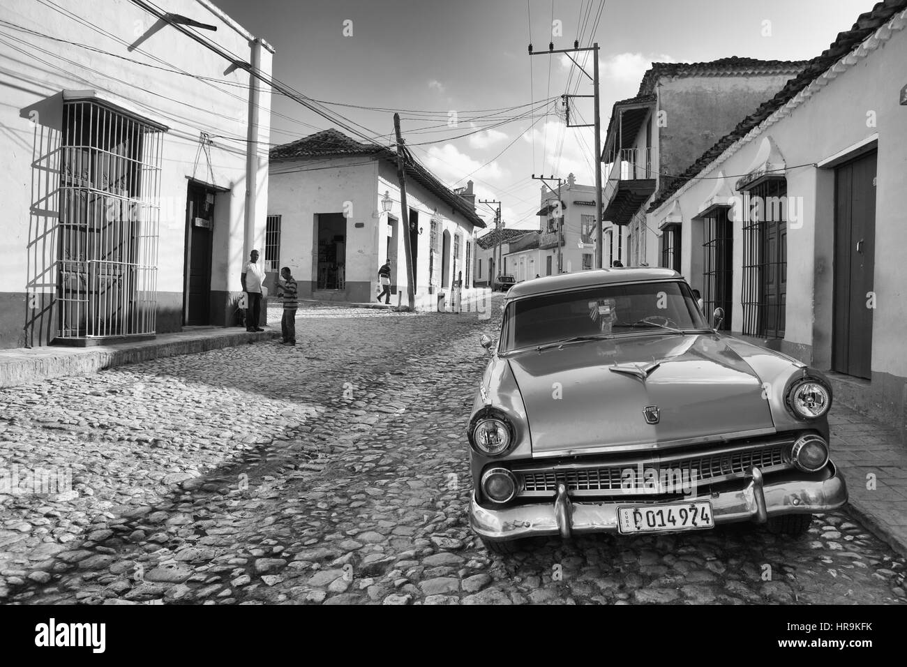 Trinidad, Cuba - January 29,2017: Old american car on the road in Trinidad, Cuba.Thousands of these cars are still in use in Cuba and they have become Stock Photo