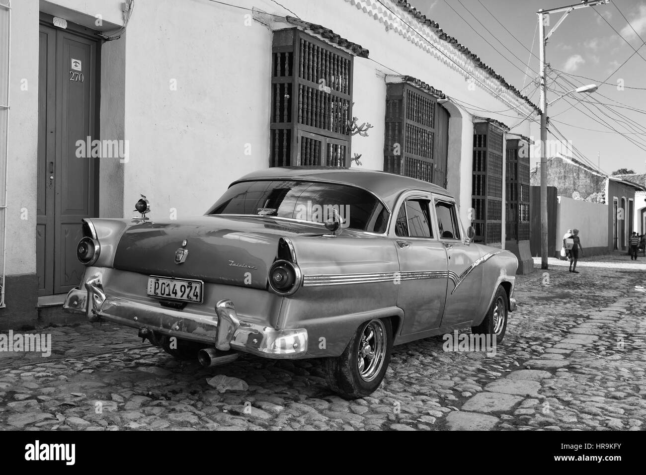 Trinidad, Cuba - January 29,2017: Old american car on the road in Trinidad, Cuba.Thousands of these cars are still in use in Cuba and they have become Stock Photo