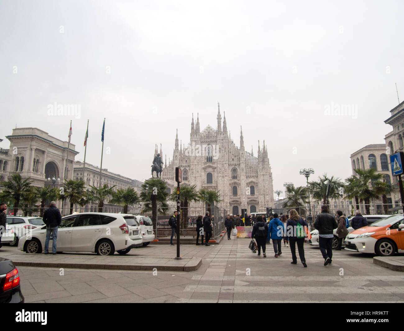 Starbucks palms in Milan, and taxi drivers protesting against uber inPiazza Duomo, during Milano Fashion Week - February 24th 2017 Stock Photo