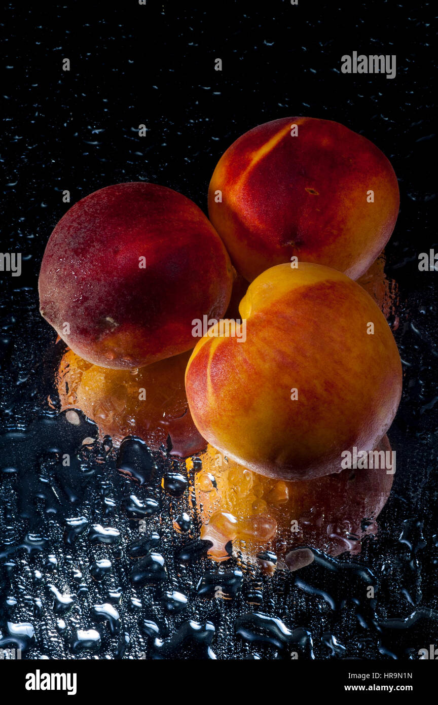 Wet peaches hi-res stock photography and images - Alamy