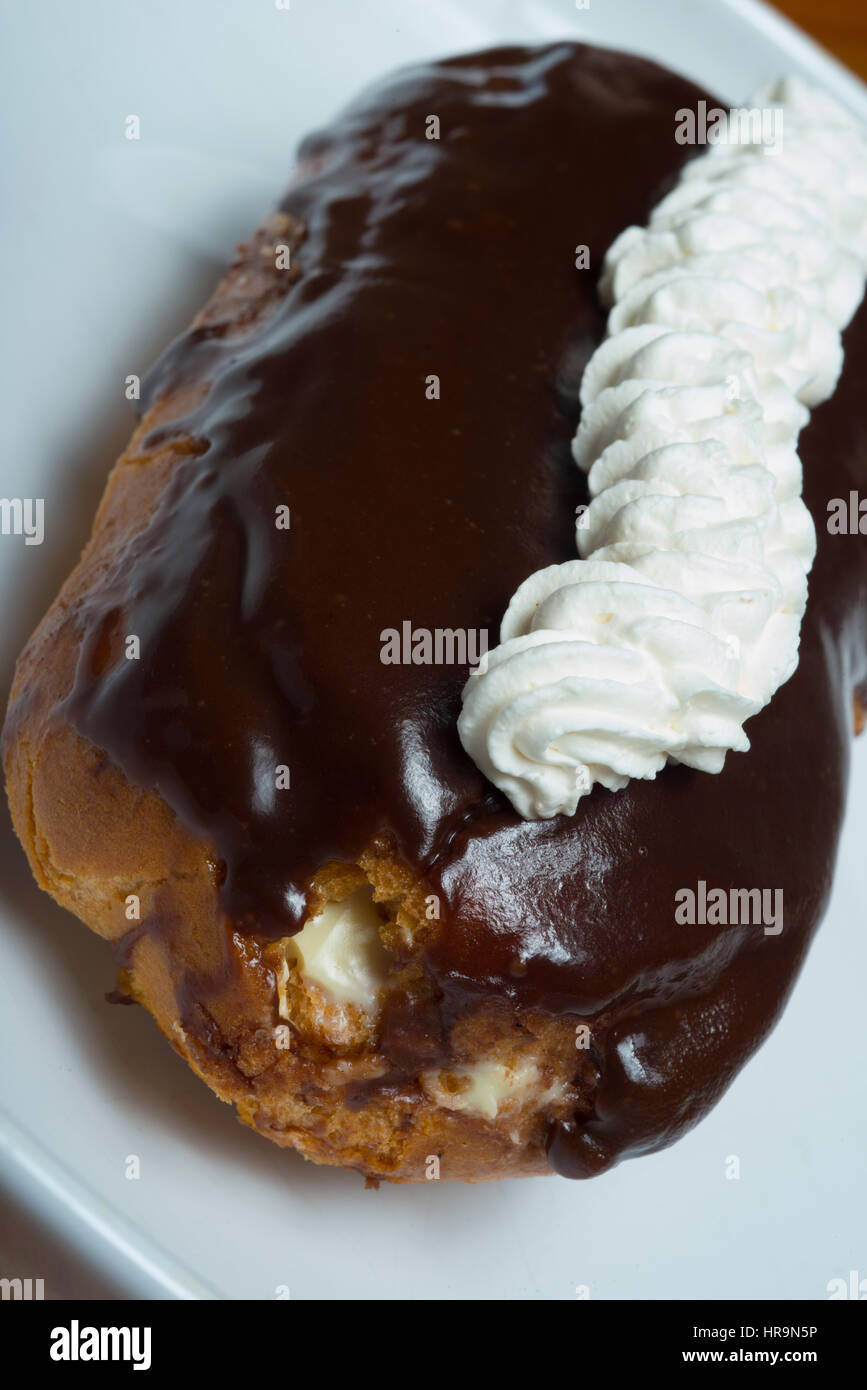 chocolate eclair with-icing Stock Photo