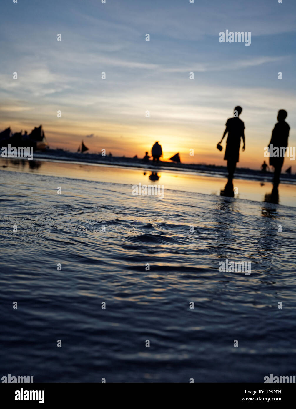 Sunset on a Beach Stock Photo - Alamy