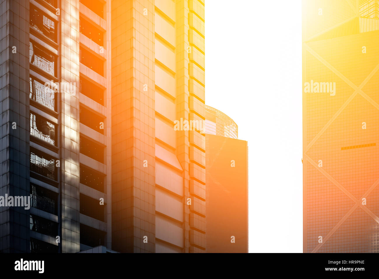 Modern office building close up in sunlight Stock Photo - Alamy