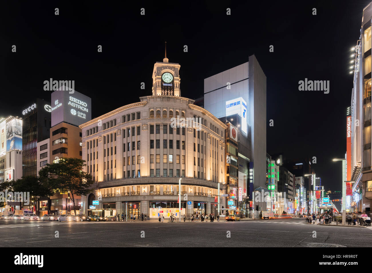 The Ginza is Tokyo's most famous upmarket shopping, dining and entertainment district, featuring numerous department stores, boutiques, art galleries, Stock Photo