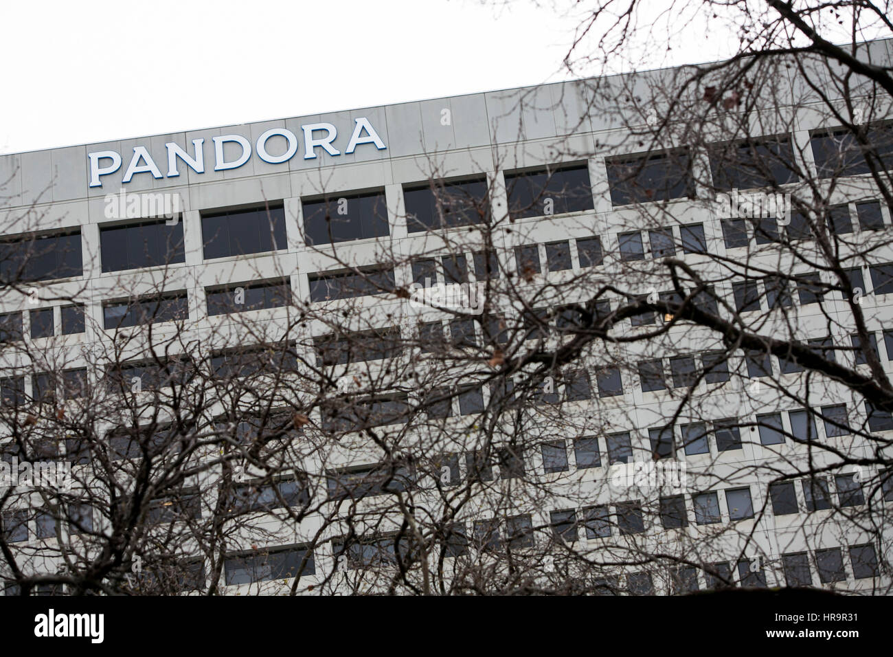 A logo sign outside of the headquarters of Pandora Media Inc., in ...