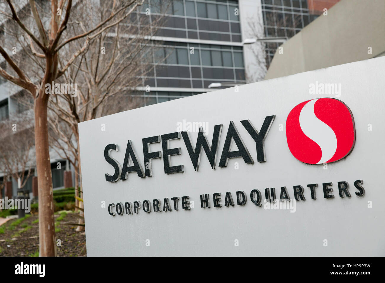 A logo sign outside of the headquarters of Safeway, Inc., in Pleasanton, California, on February 18, 2017. Stock Photo