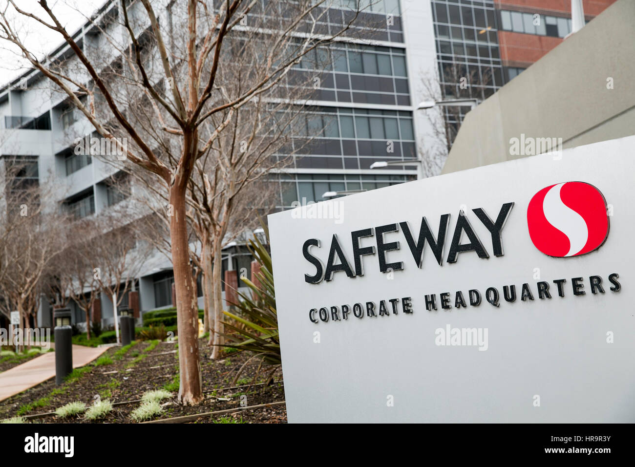 A logo sign outside of the headquarters of Safeway, Inc., in Pleasanton, California, on February 18, 2017. Stock Photo