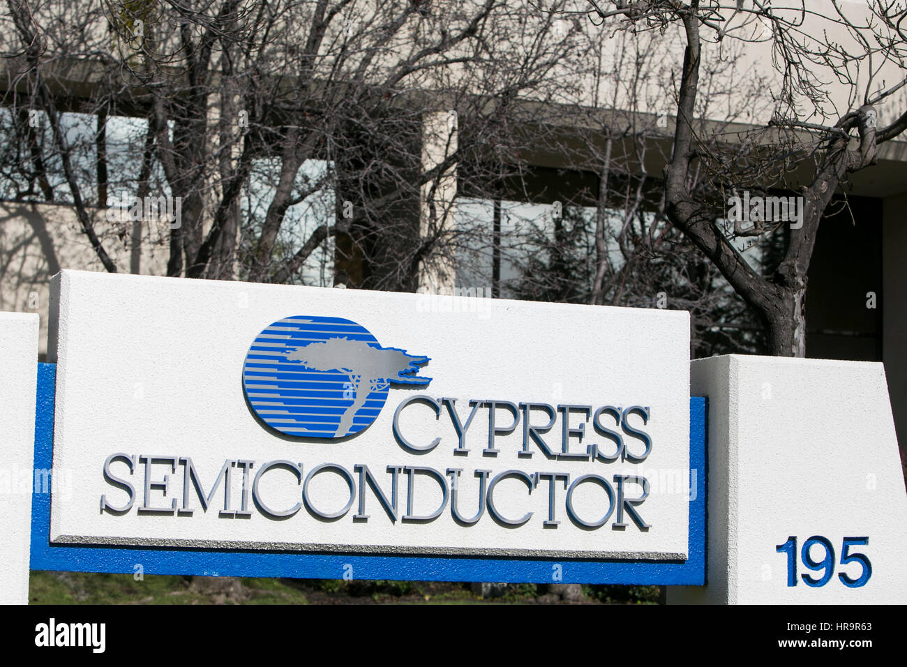 A logo sign outside of the headquarters of Cypress Semiconductor in San Jose, California, on