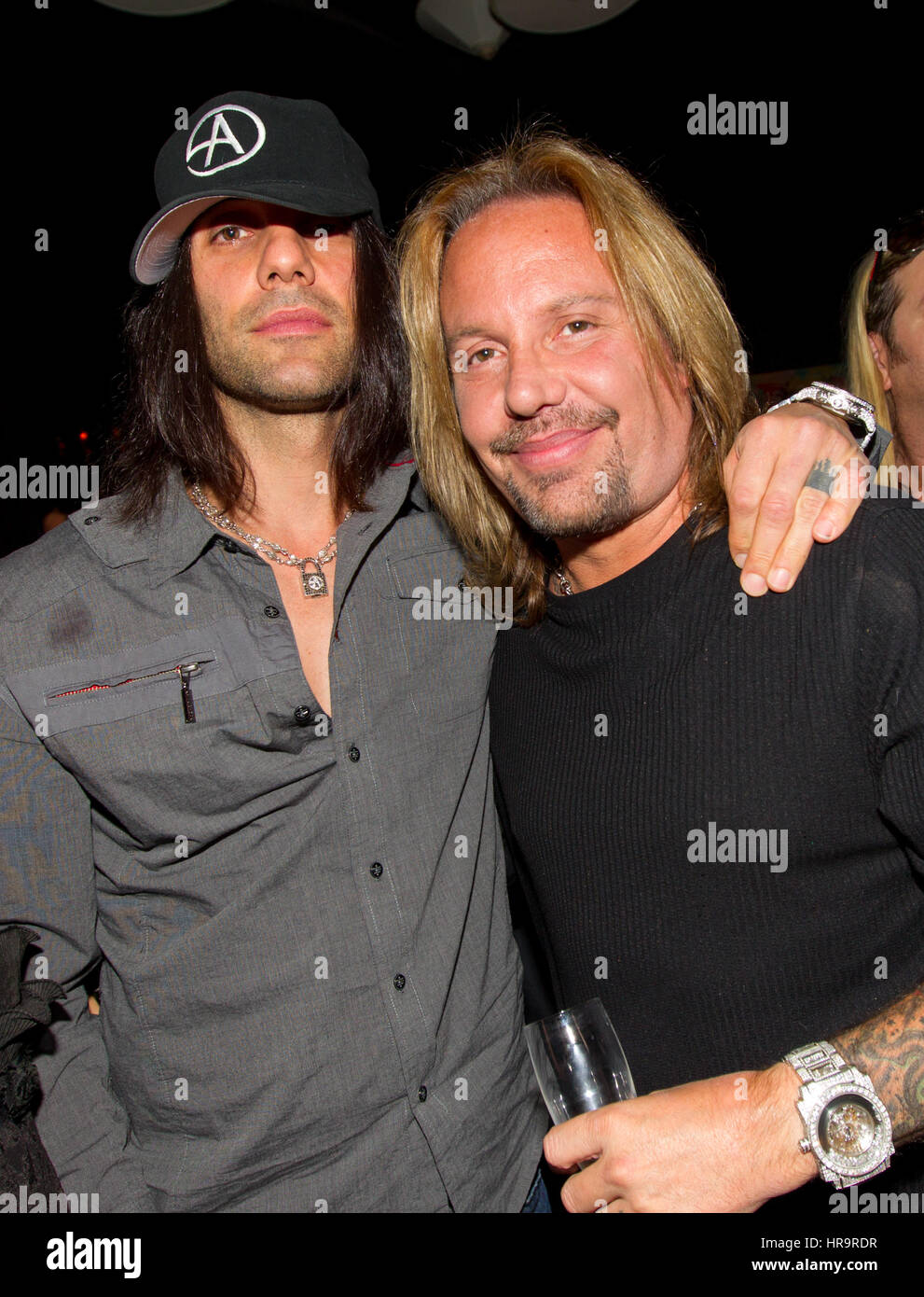 Criss Angel, and Vince Neil pictured at Robin Leach and Michael Boychuck Birthday party at Blush at The Wynn Las Vegas in Las Vegas, NV on September 10, 2010. Stock Photo