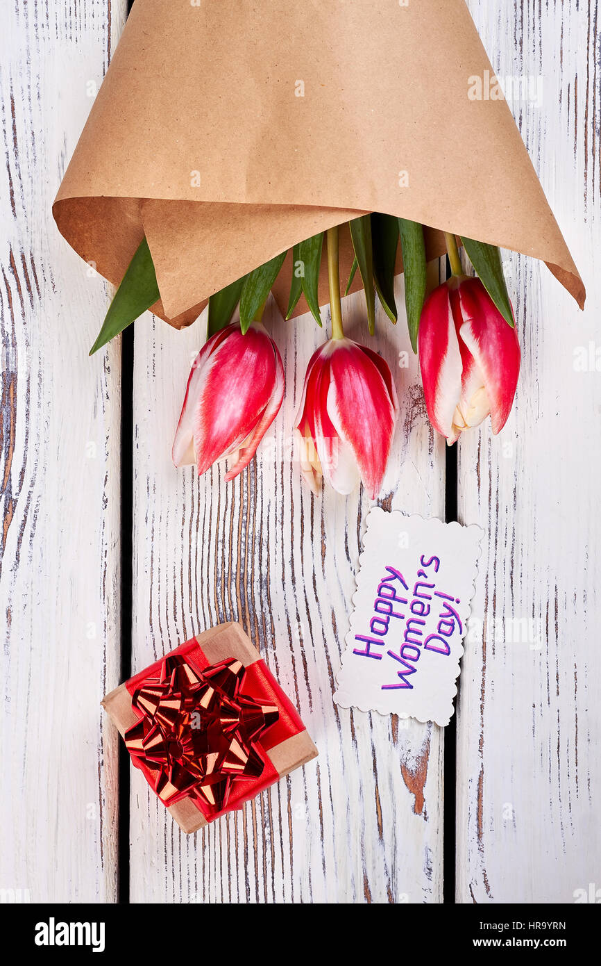 Present box and spring flowers Stock Photo - Alamy