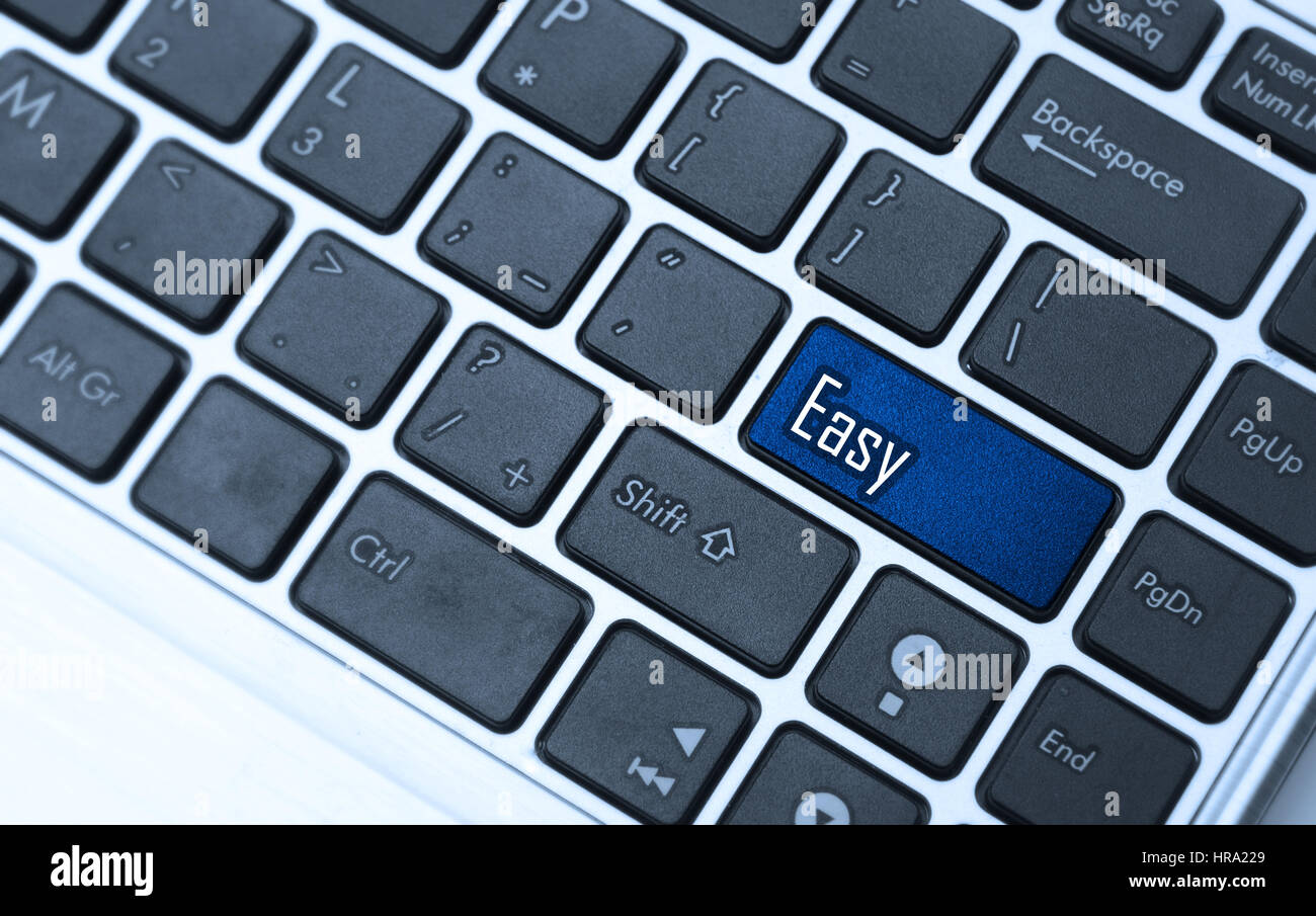 Keyboard with blue key button - Easy Stock Photo