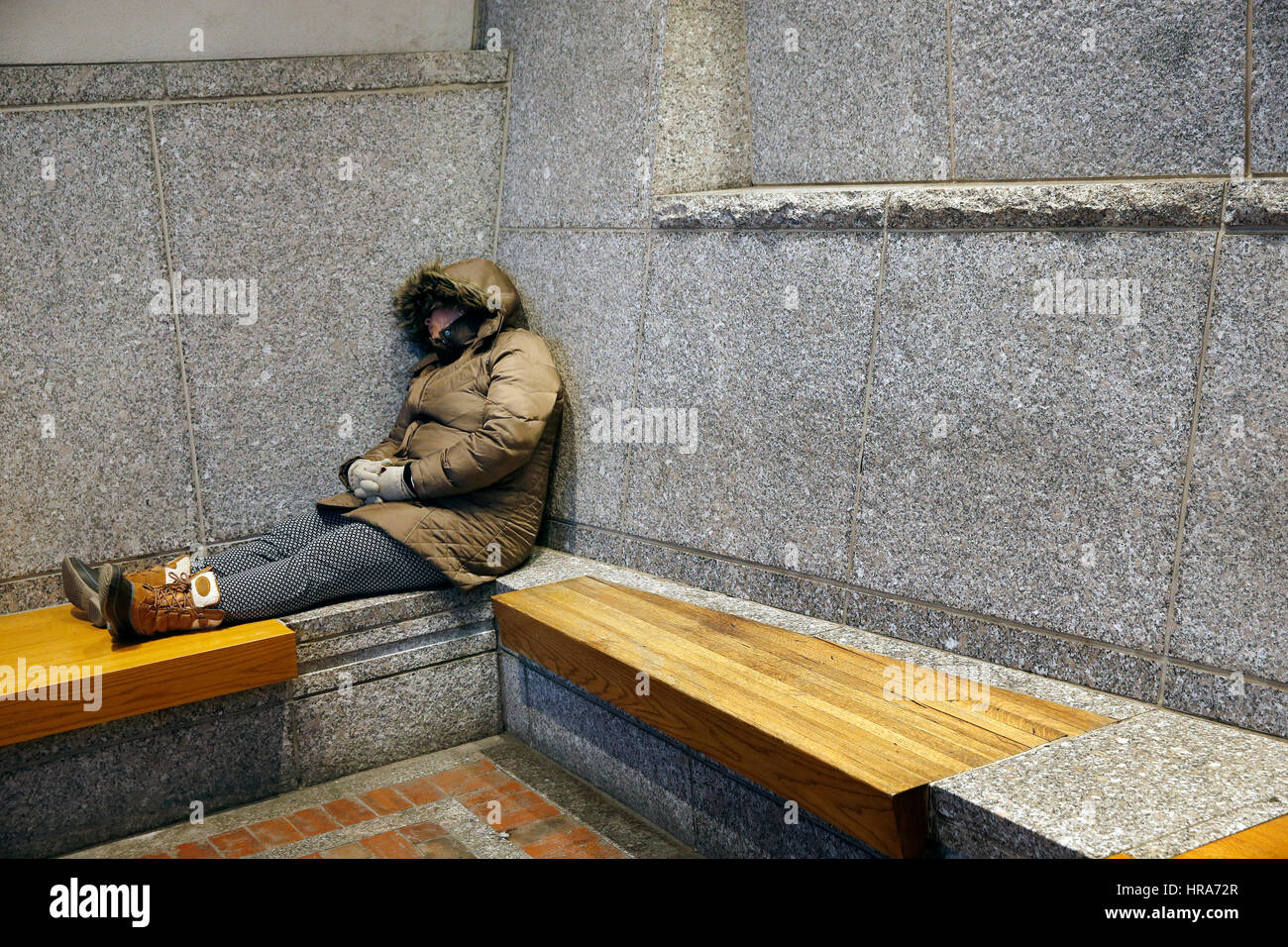 Woman sleeping on bench in park hi-res stock photography and images - Alamy
