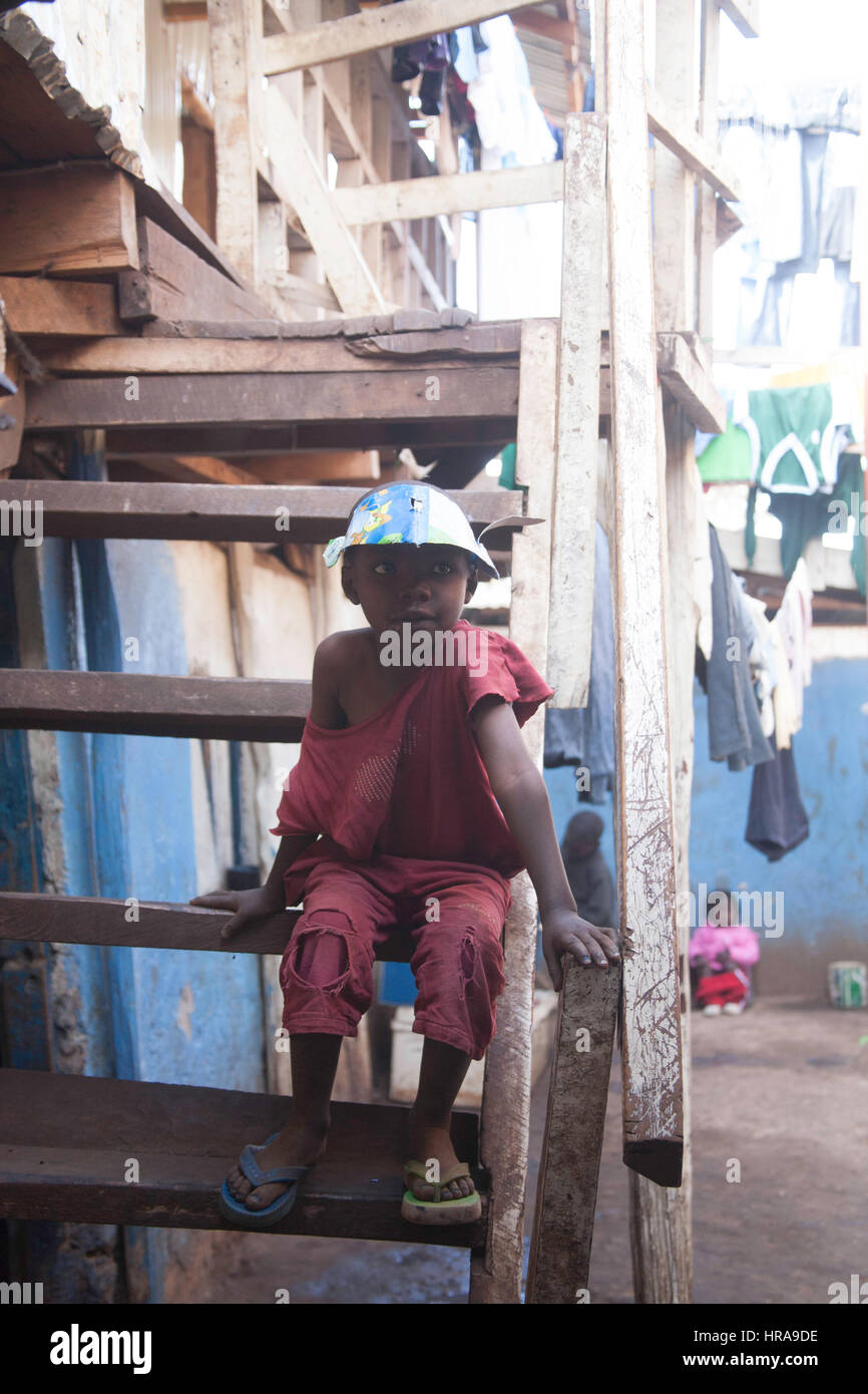 Orphan in the orphanage, Kibera slums, Nairobi, Kenya, East Africa Stock Photo