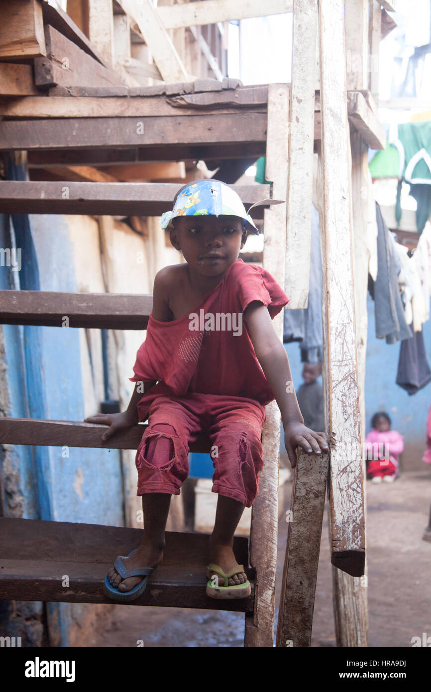 Orphan in the orphanage, Kibera slums, Nairobi, Kenya, East Africa Stock Photo