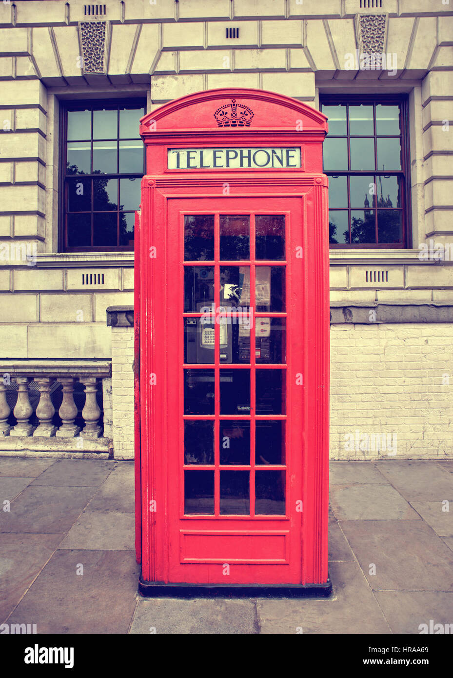 Retro red phone box in london with big ben hi-res stock