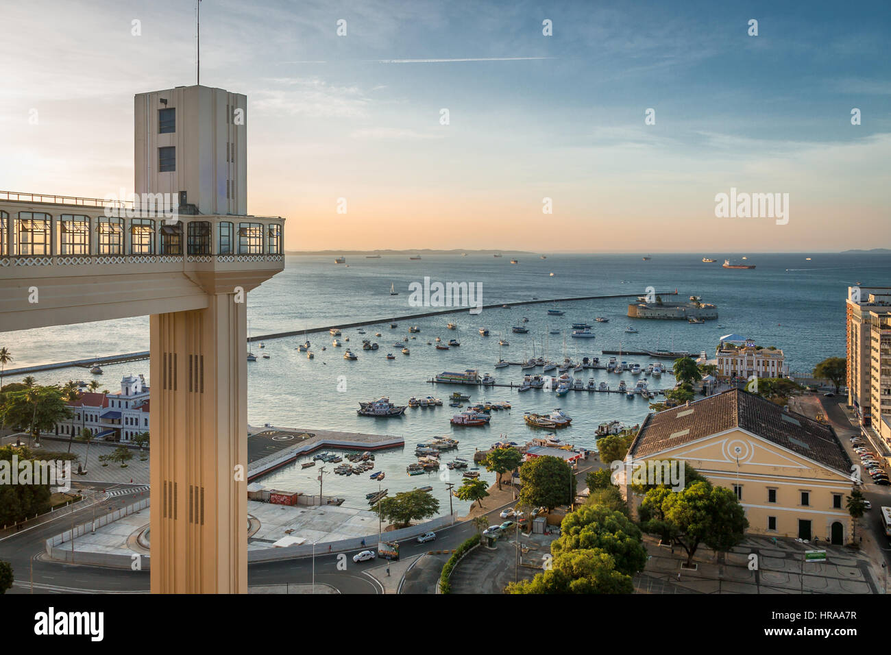 Sunset in Lacerda Elevator and All Saints Bay (Baia de Todos os Santos) in Salvador - Bahia, Brazil Stock Photo