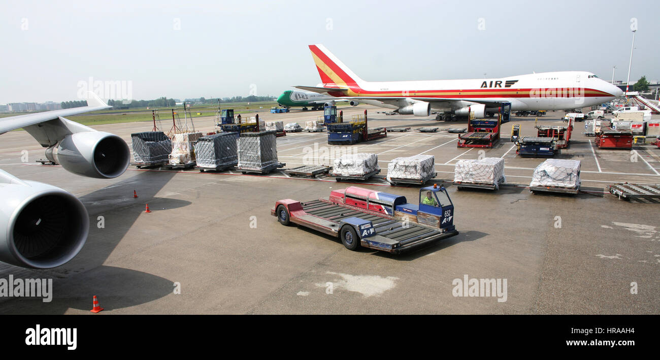 cargo planes being loaded at schiphol airport Stock Photo