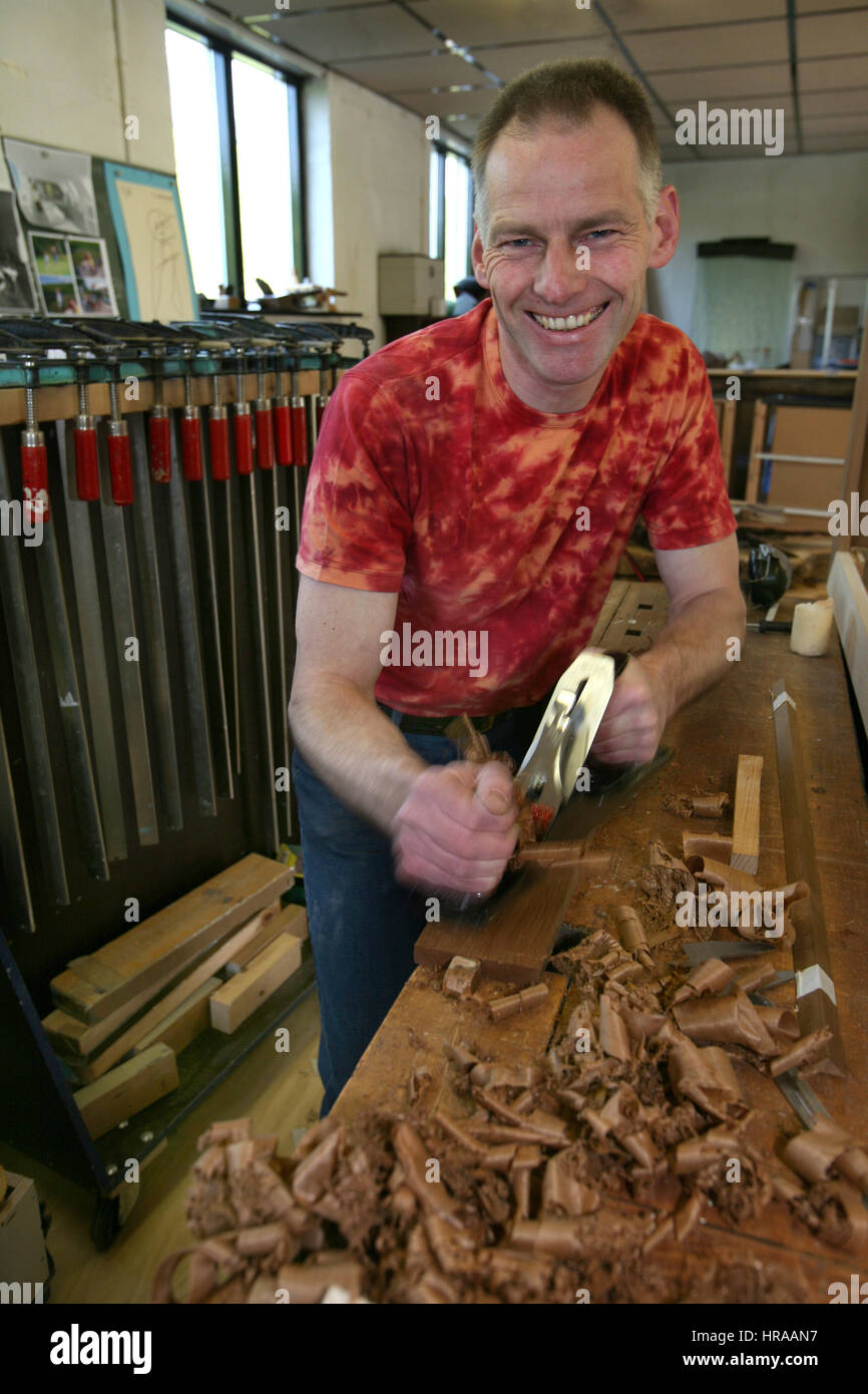 furniture maker at work in his Stock Photo Alamy