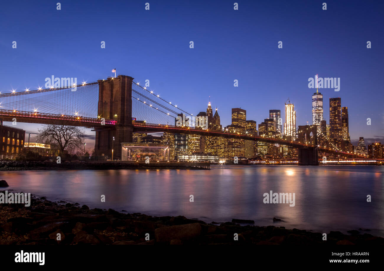 Brooklyn Bridge and Manhattan Skyline at sunset - New York, USA Stock ...