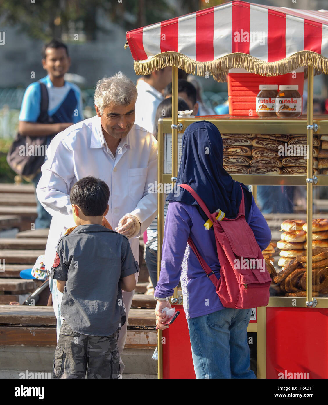SELLING SIMIT AND OTHER BREAD  FROM TROLLEY IN Sultanahmet Square Istanbul Turkey Stock Photo