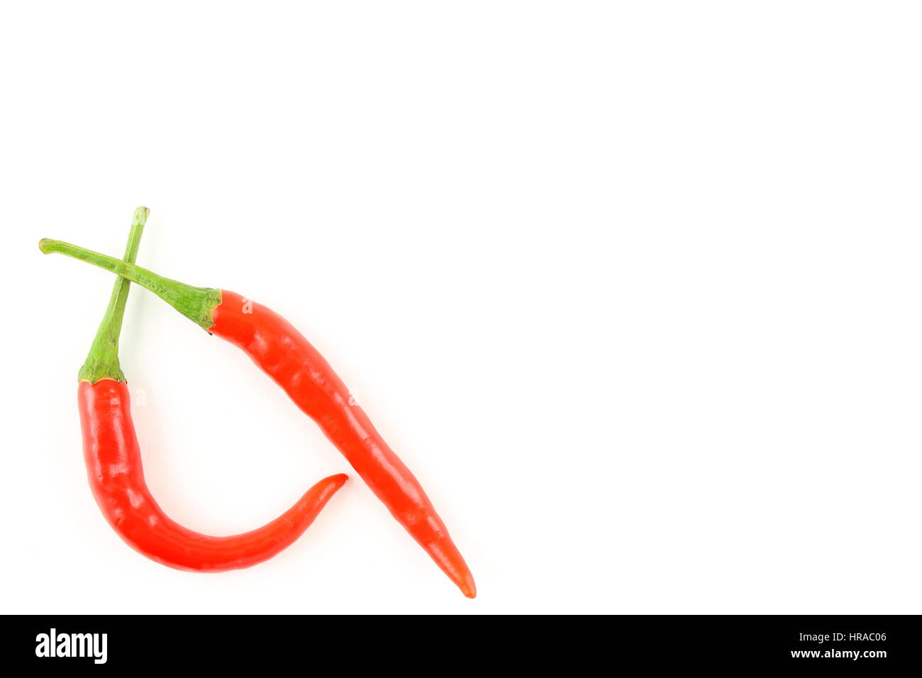 fresh thai chili peppers isolated on a white background as a food background texture Stock Photo