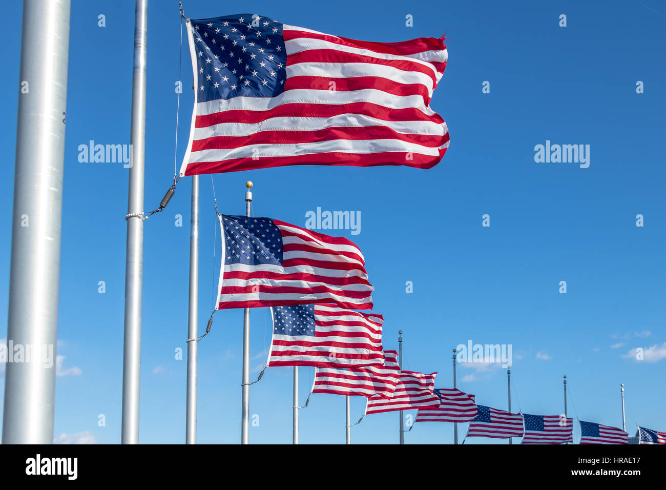 Many American Flags Waving at Washington Monument - Washington, D.C., USA Stock Photo