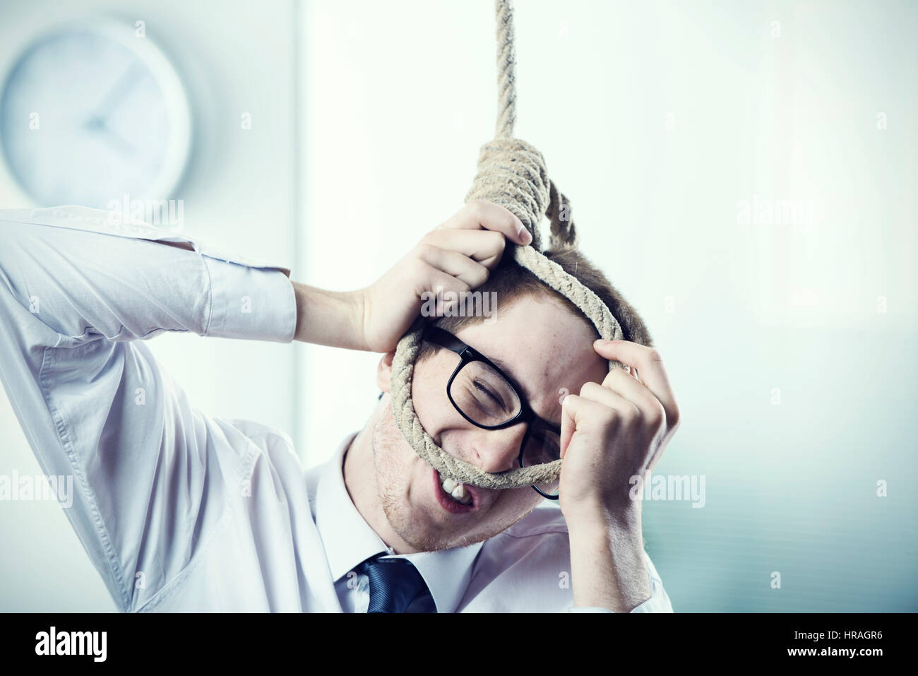 A office worker is setting up a noose Stock Photo