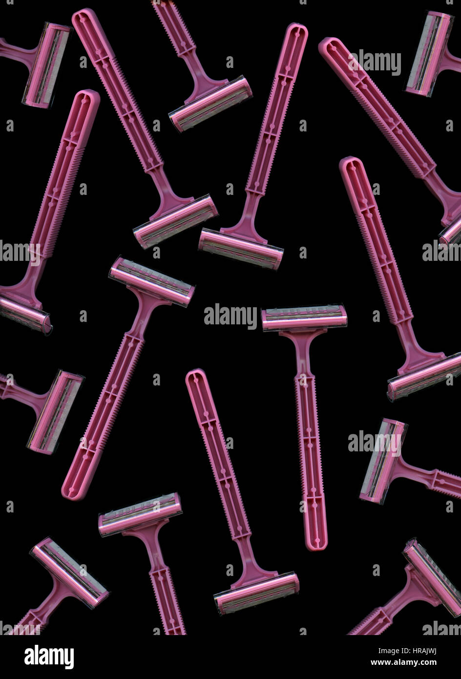 Top view of pink razors on black background Stock Photo