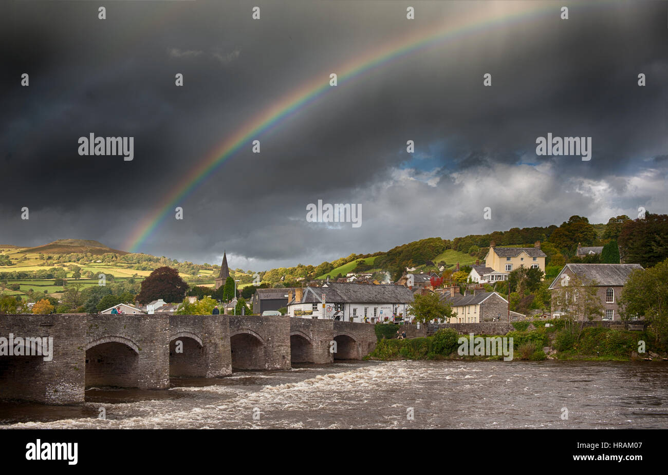 A rainbow over the River Usk at Crickhowell with Sugar Loaf in the Background, Brecon Beacons National Park, Wales UK Stock Photo
