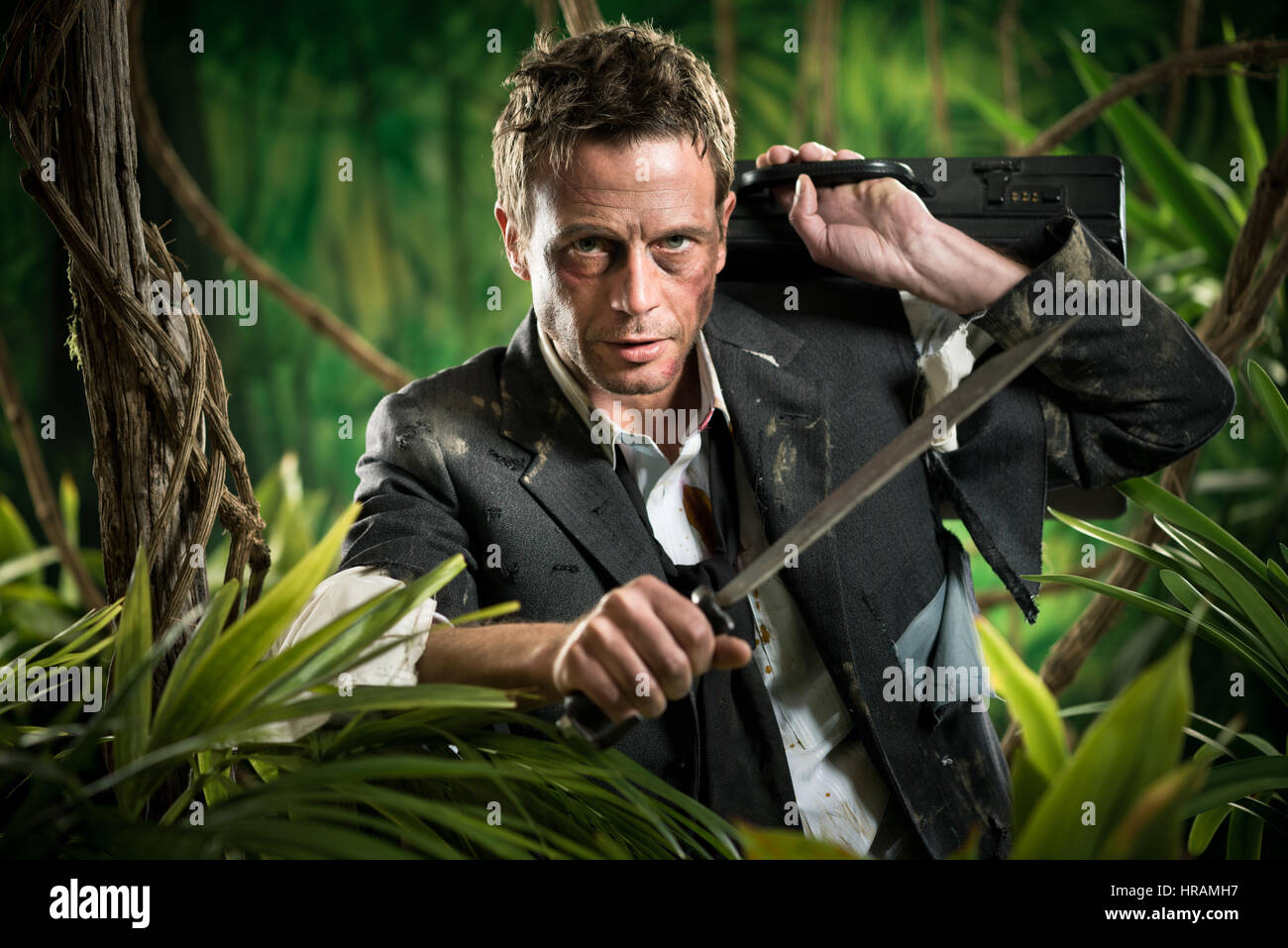 Holding machete jungle hi-res stock photography and images - Alamy