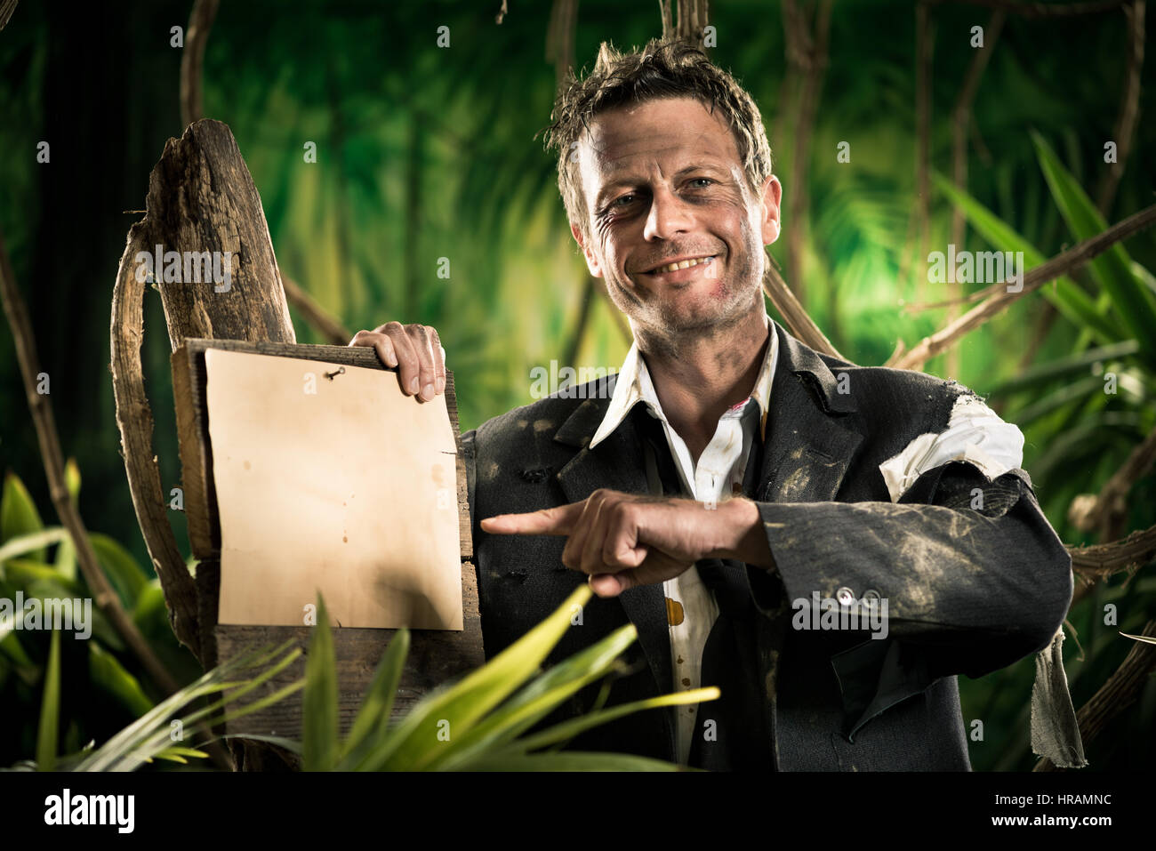 Smiling explorer in jungle hi-res stock photography and images - Alamy