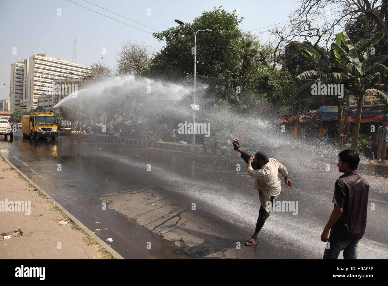 Dhaka, Bangladesh. 28th Feb, 2017. Police use a water canon and tear ...