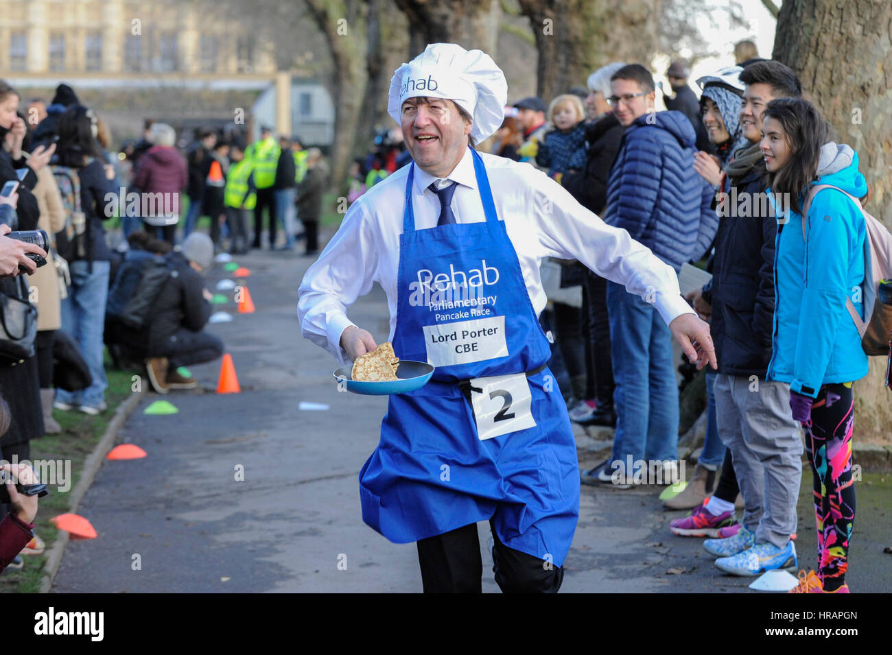 London, UK.  28 February 2017.  Lord Porter.  Members of the House of Lords, Houses of Parliament and the political media take part in the annual Shrove Tuesday Pancake Race near Westminster.   Credit: Stephen Chung / Alamy Live News Stock Photo
