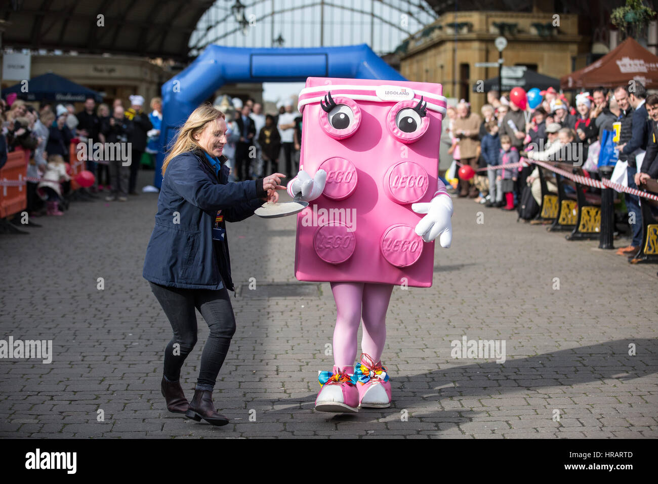 Windsor, UK. 28th Feb, 2017. Mascots from local businesses compete in the 11th Windsor & Eton Pancake Race in aid of Alexander Devine Hospice Services. Credit: Mark Kerrison/Alamy Live News Stock Photo