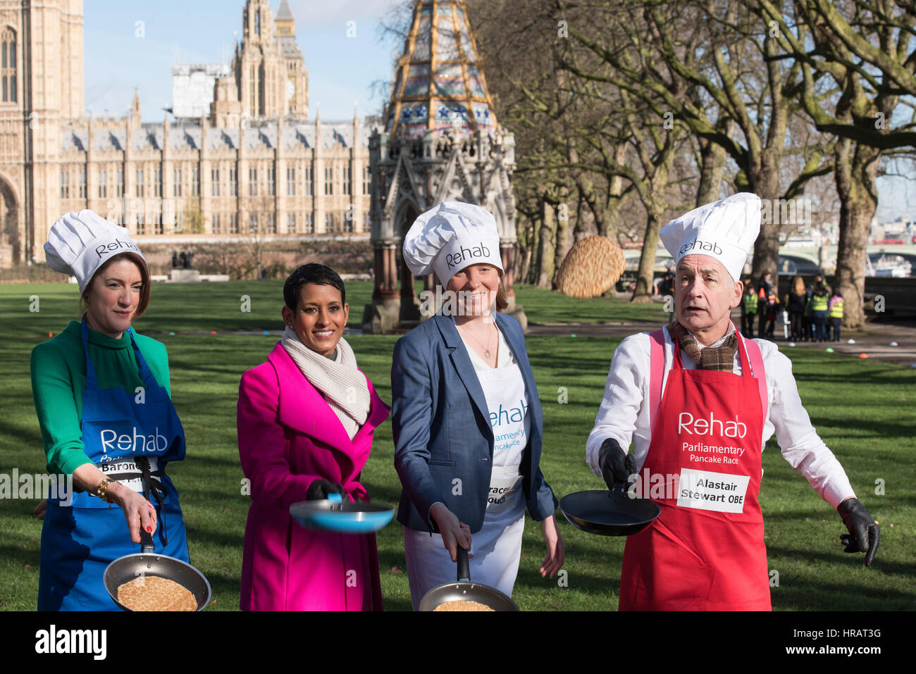London, UK. 28th Feb, 2017. Team captains and Naga Munchetty practice a toss at the start of the Rehab Parliamentary Pancake race. Left to right Barnoness Bertin, Naga Munchetty, Tracy Crouch MP and Alastair Steward OBE Credit: Ian Davidson/Alamy Live News Stock Photo